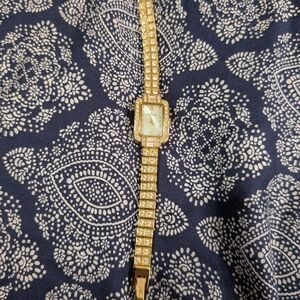 Elegant Gold-Tone Watch with Crystal Accents